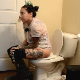 A girl with tattoos takes a piss and a shit while sitting on a toilet. Loose pooping can be heard. She talks about the spicy potato soup she ate the night before and how it can result in these types of shits. Presented in 720P HD. Over 3 minutes.